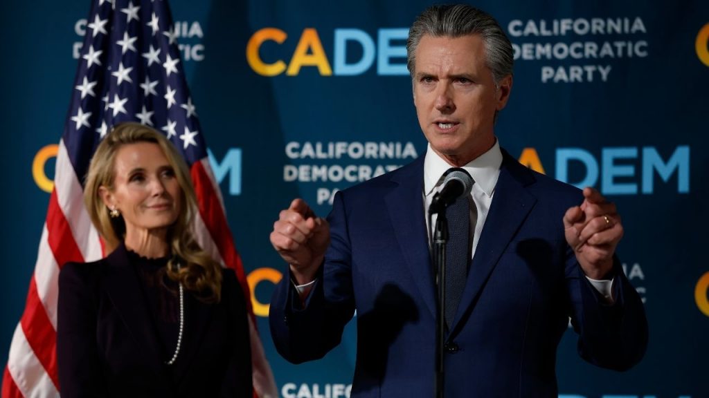 WOAH! – Gavin Newsom’s Wife Pushes Him Then Humiliates Him On Stage